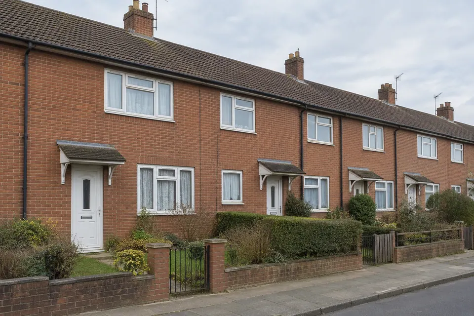 Illustrative image of a row of UK terraced homes